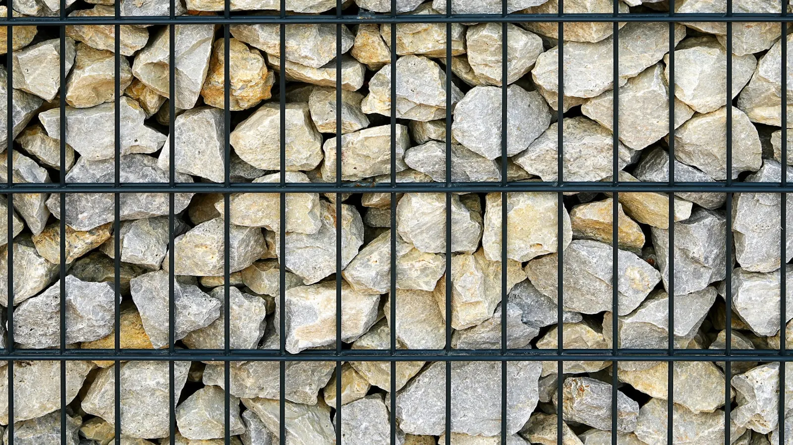 Tan stone retaining wall finished detail